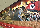 Miembros de la comunidad hispana se movilizaron para impedir que el Mural Chicano fuera removido a otra área porque hubiera representado un daño para la obra