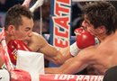 Donito Donaire (izqda.) conecta un gancho al rostro de Jorge "el travieso" Arce para llevarse la victoria.