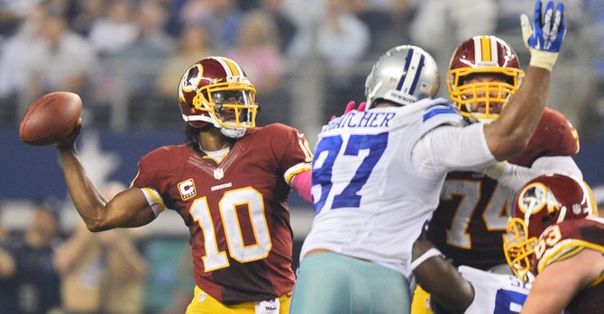 Cowboys propinan duro golpe a Redskins