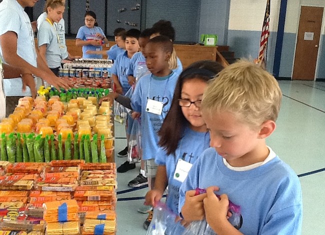 Virginia - Niños preparán comidas para menores necesitados