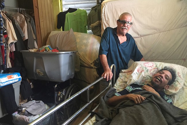 En las montañas de Puerto Rico, la pesadilla de María no terminó para este padre y su hijo