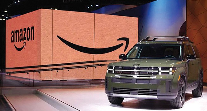 Los usuarios de Amazon podrán comprar vehículos en esa plataforma desde el próximo año.