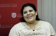 Guillermina García sonríe durante una conferencia de prensa el martes 28 de mayo del 2013, en el Hospital de la Universidad de Utah en Salt Lake City. García dio a luz a quintillizos, tres niñas y dos niños, el domingo con la ayuda de un equipo de ocho médico que dirigieron un equipo 40 integrantes del personal médico. Los recién nacido están en buen estado de salud.