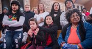 Durante la misa llevaba acabo en First Baptist Church Armando Tema, 27, guatemalteco, de Baltimore (Gorra) , a su lado Lydia Walther Rodriguez, activista de CASA, participan del encuentro realizado el lunes 19 de Enero.