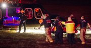 A patient is brought to a helicopter following a shooting outside Frederick High School.