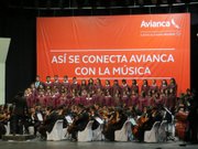 La Orquesta y Coro Sinfónico Polígono Industrial Don Bosco en un concierto el 10 de abril en San Salvador.