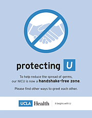 Aviso de zona libre de apretones de mano en el UCIN del Centro Médico Ronald Reagan de UCLA.