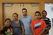 Una familia de Sociedad Latina. La organización estará ayudando a las familias boricuas que lleguen a Boston.
