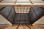 Daniela Rivera, Tilted Heritage, 2015, ash on canvas, stretcher bars, C clamps, pulley system and rope, 30’ x 10’ x 20’. Courtesy of artist.