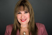 Eneida Román es abogada y líder comunitaria. Su página web es www.eromanlaw.com y el teléfono de su oficina es 617-266-4448